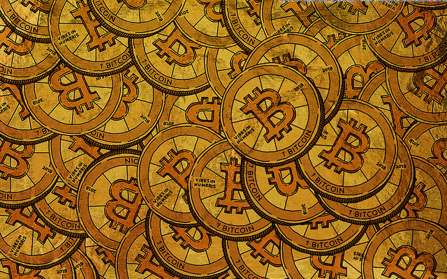 Image: Artistic rendering of goldcoins with a B in the center and 1 Bitcoin written beneath.