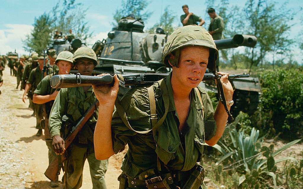 Image: Soldiers marching in Vietnam, 1965.