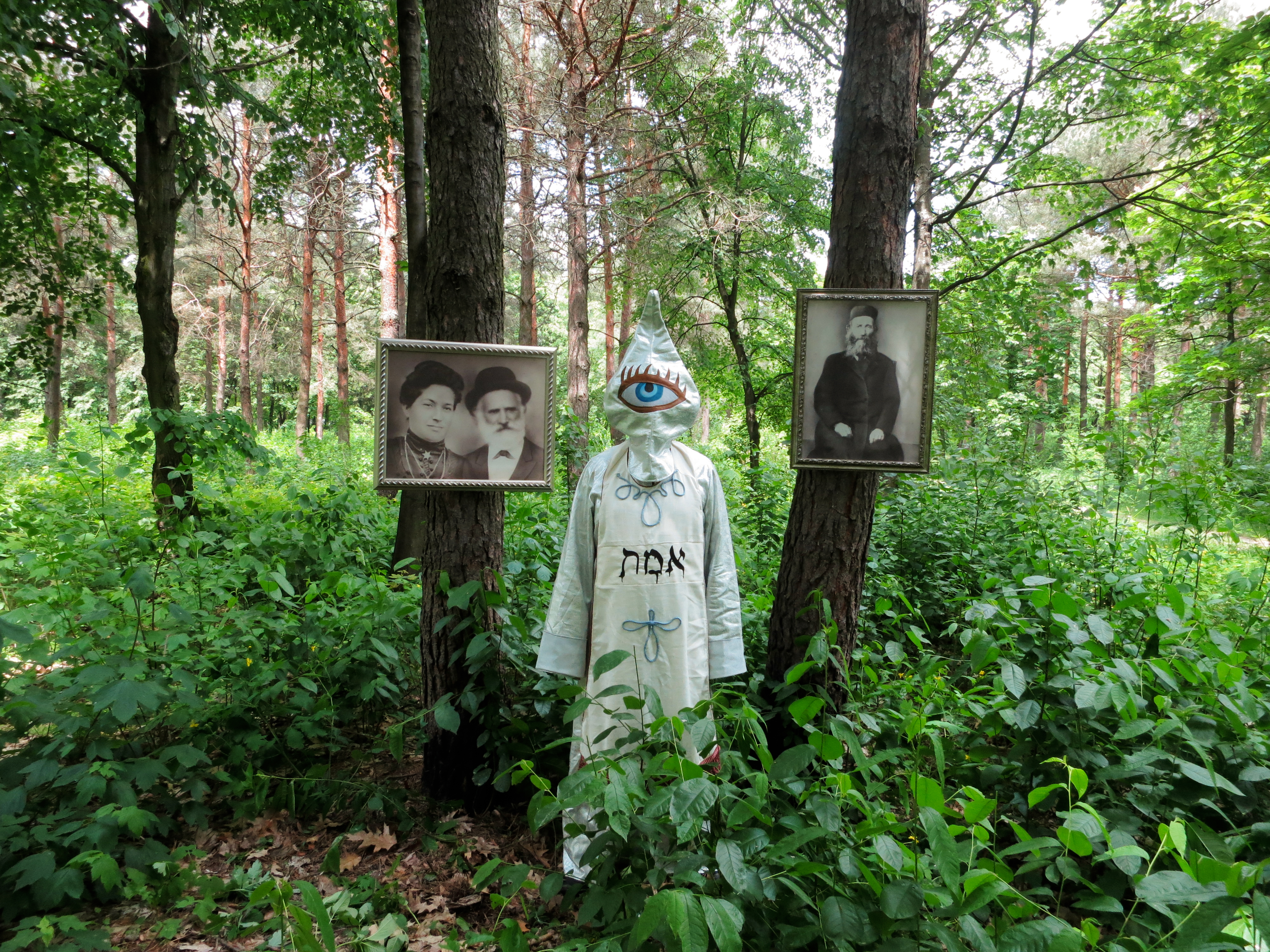 Image: Gary in the woods in Poland/Ukraine where his father hid and fought.